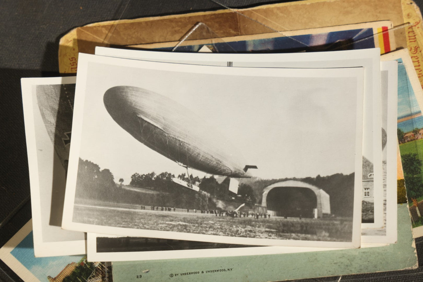 Grouping of 20+ Vintage Zeppelin and Dirigible Ephemera including Real Photo Postcards R.P.P.C., Seaside Heights Souvenir, and Portrait of Ferdinand Von Zeppelin
