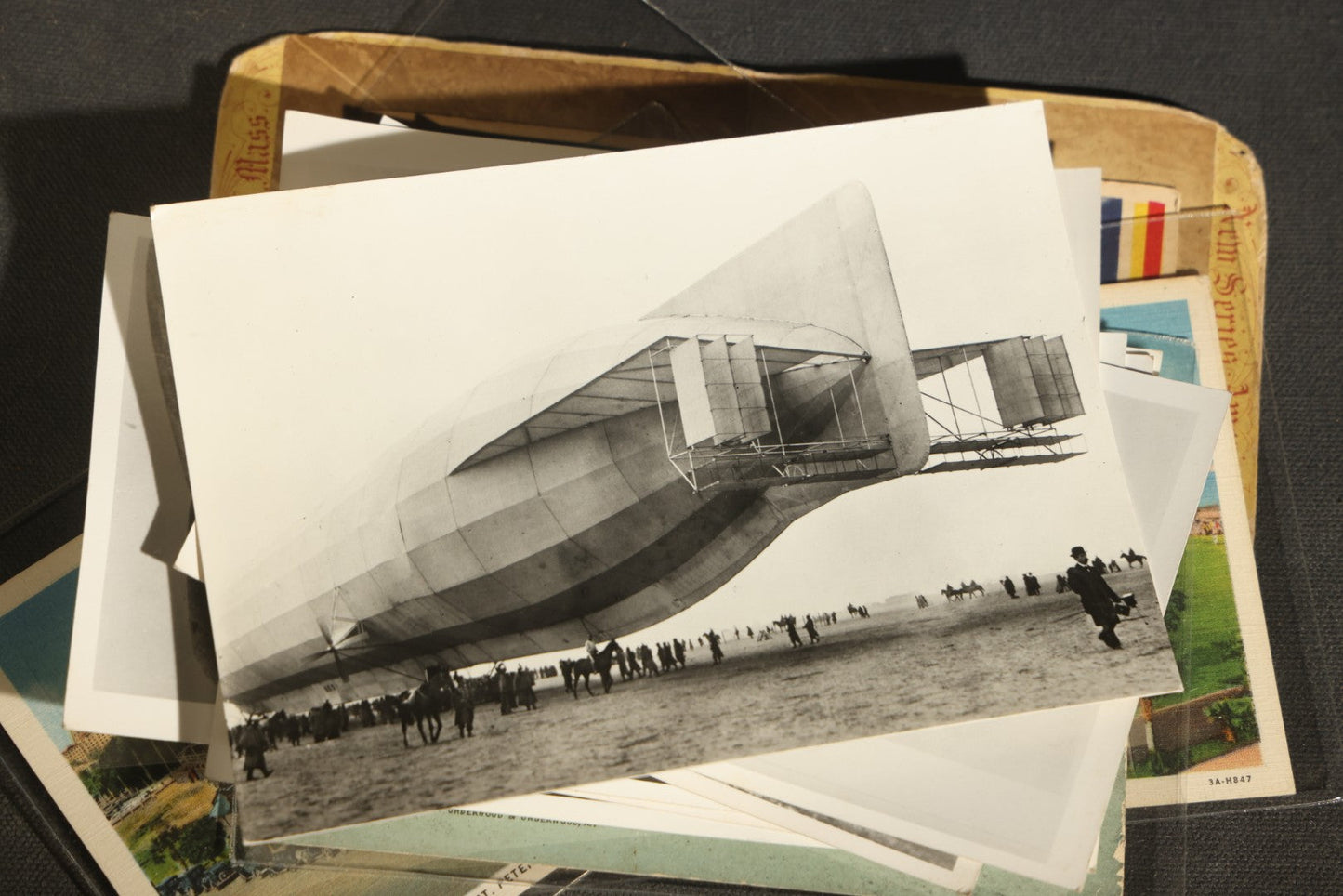 Grouping of 20+ Vintage Zeppelin and Dirigible Ephemera including Real Photo Postcards R.P.P.C., Seaside Heights Souvenir, and Portrait of Ferdinand Von Zeppelin