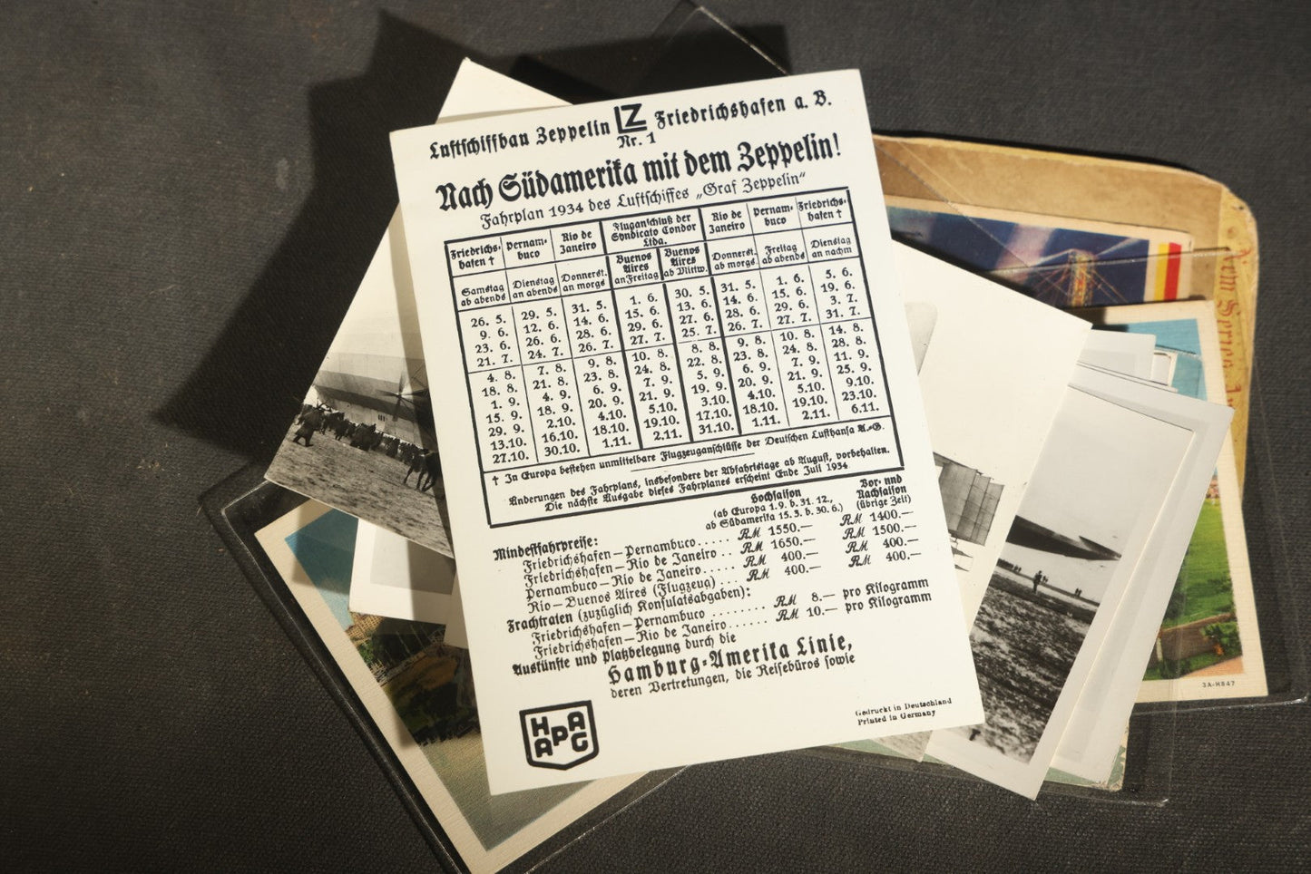 Grouping of 20+ Vintage Zeppelin and Dirigible Ephemera including Real Photo Postcards R.P.P.C., Seaside Heights Souvenir, and Portrait of Ferdinand Von Zeppelin