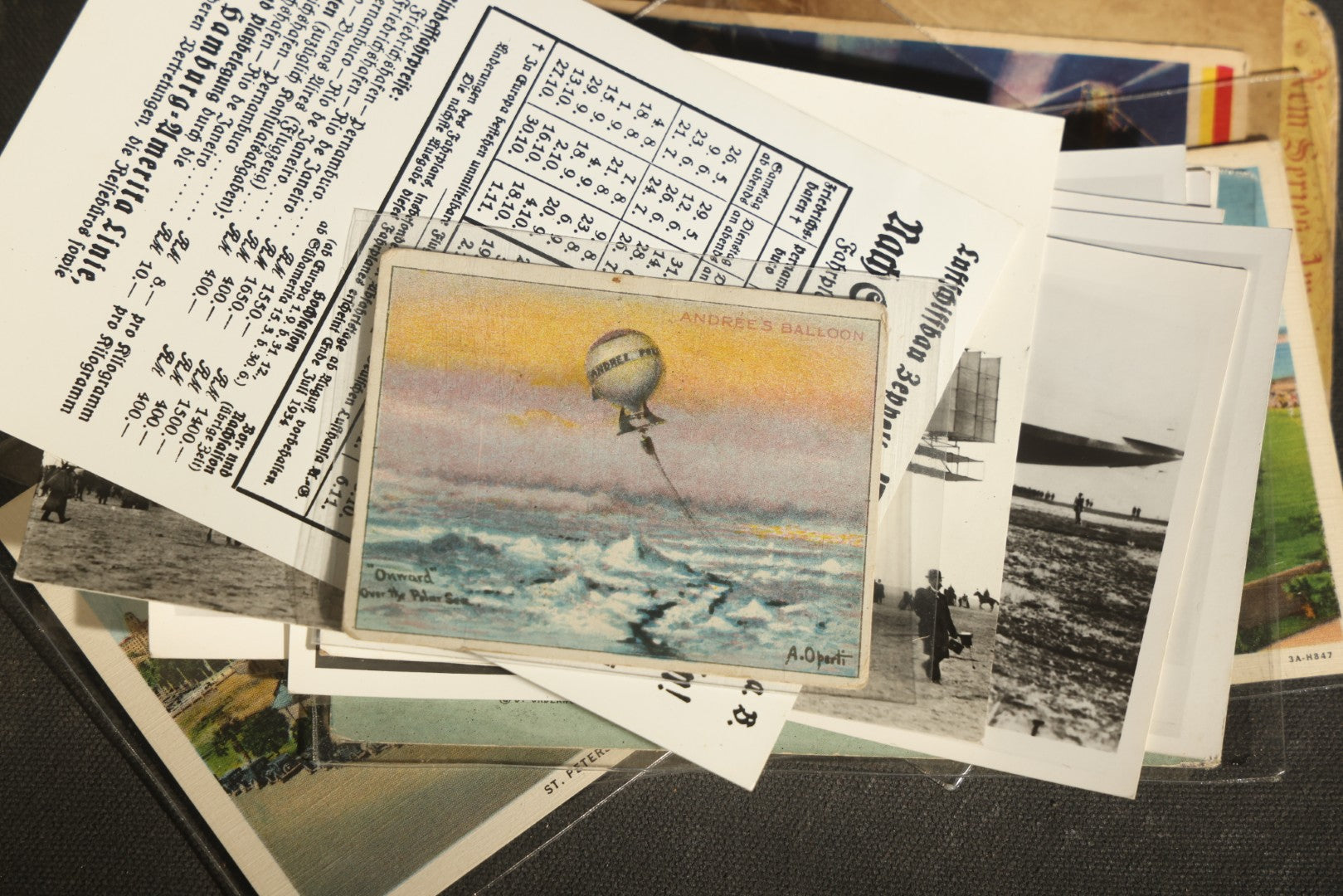 Grouping of 20+ Vintage Zeppelin and Dirigible Ephemera including Real Photo Postcards R.P.P.C., Seaside Heights Souvenir, and Portrait of Ferdinand Von Zeppelin