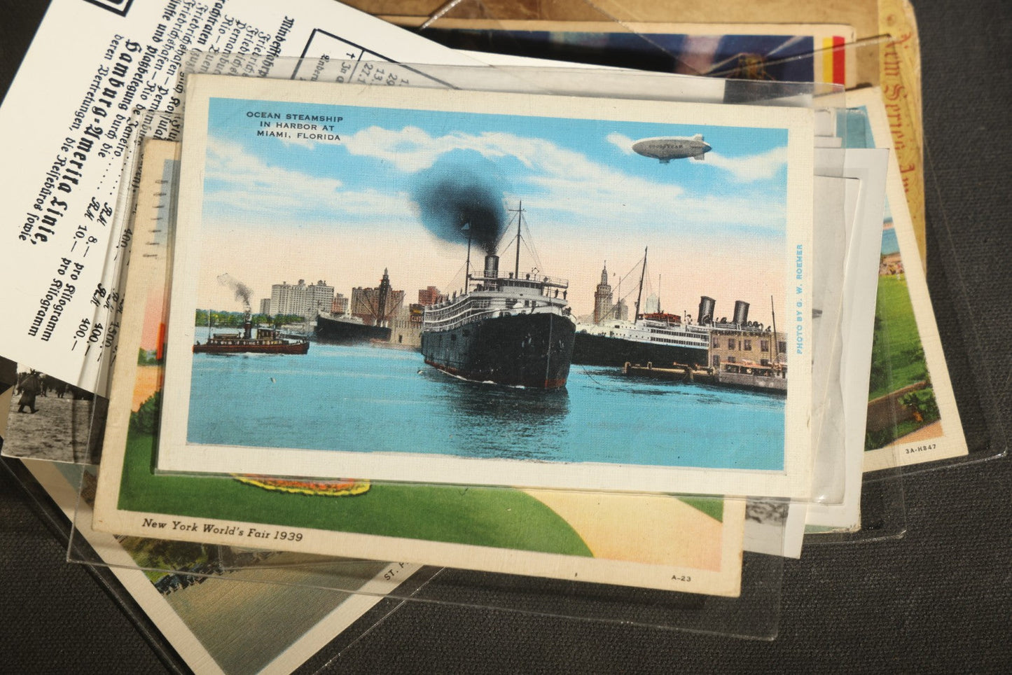 Grouping of 20+ Vintage Zeppelin and Dirigible Ephemera including Real Photo Postcards R.P.P.C., Seaside Heights Souvenir, and Portrait of Ferdinand Von Zeppelin