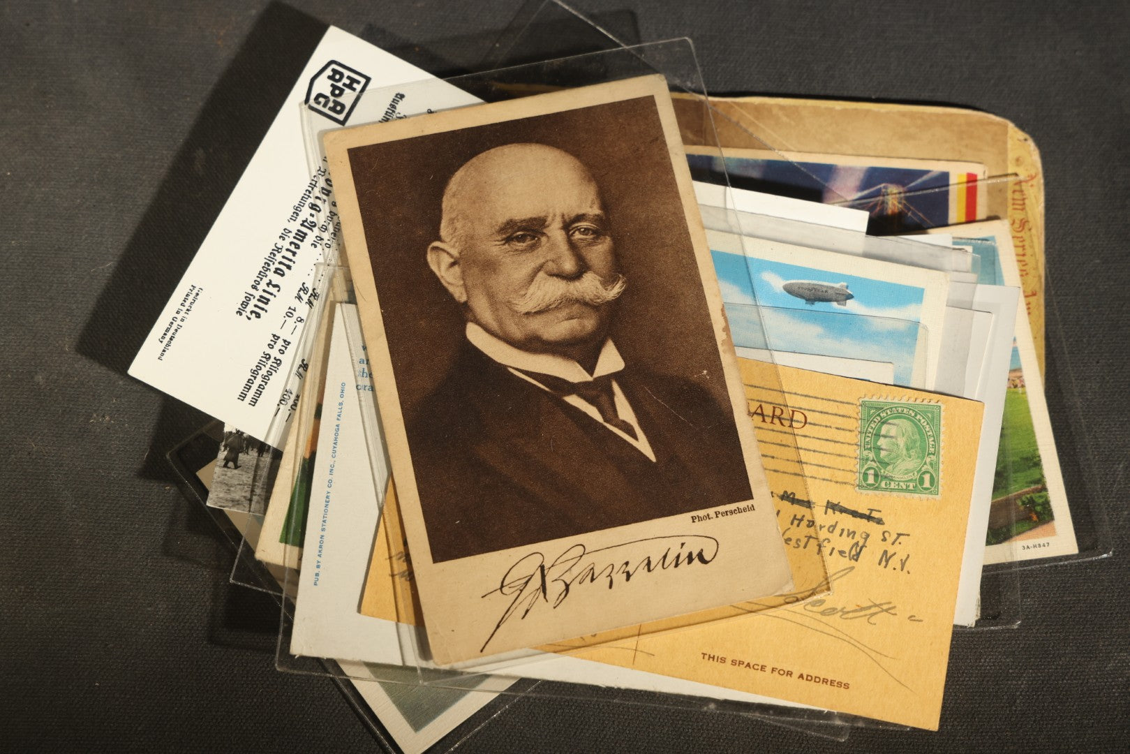 Grouping of 20+ Vintage Zeppelin and Dirigible Ephemera including Real Photo Postcards R.P.P.C., Seaside Heights Souvenir, and Portrait of Ferdinand Von Zeppelin