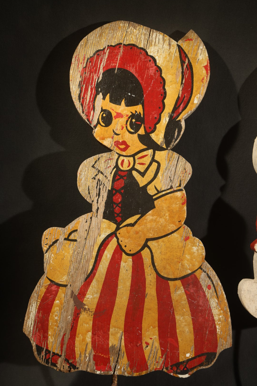 Trio of Vintage Folk Art Painted Wood Lawn Ornaments Including Two Girls in Bonnets with Red and White Striped Skirts and White Rabbit