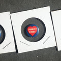 Lot 014 - Trio of Buttons, Liberty Loan 1917, Charity Chest, and United War Campaign for the Boys Over There
