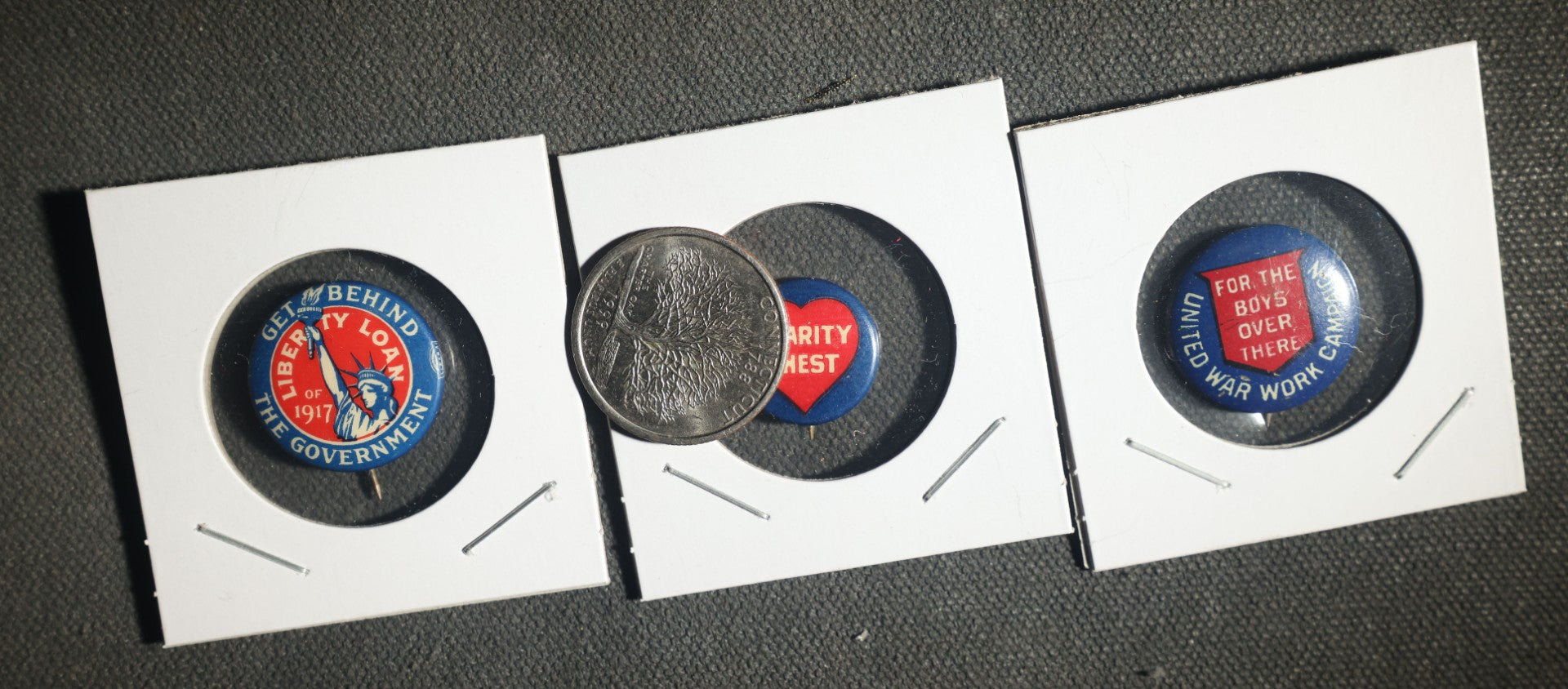 Trio of Buttons, Liberty Loan 1917, Charity Chest, and United War Campaign for the Boys Over There