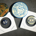 Lot 016 - Four Buttons, Chauffer License State of Oregon 1949, Fin and Feathre Club of Wellesley and Natick Mass 1977, Sterling Range, and "45"