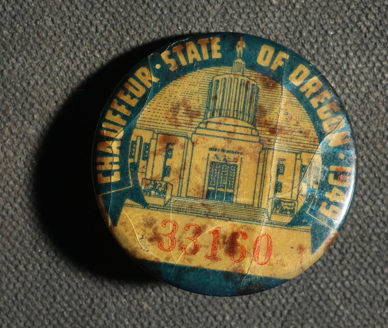 Four Buttons, Chauffer License State of Oregon 1949, Fin and Feathre Club of Wellesley and Natick Mass 1977, Sterling Range, and "45"