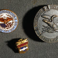 Lot 026 - Trio of Pins Including National Rifle Association of America, AFL-CIO Screw Back, and P.M. Convention Atlantic City 1919