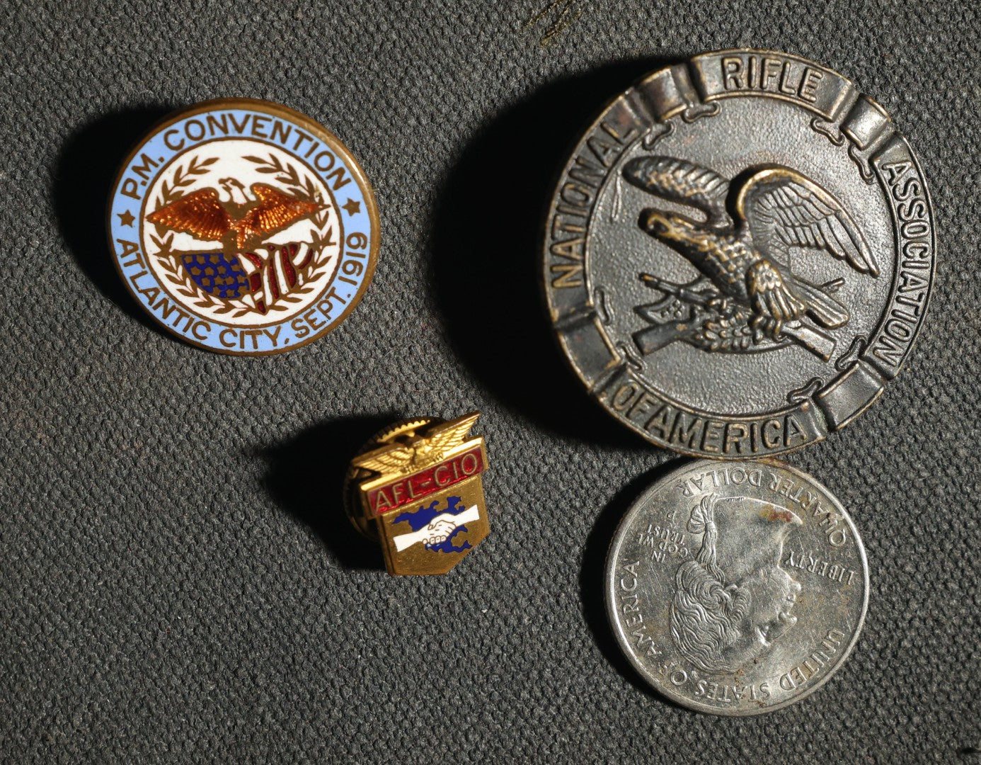 Trio of Pins Including National Rifle Association of America, AFL-CIO Screw Back, and P.M. Convention Atlantic City 1919