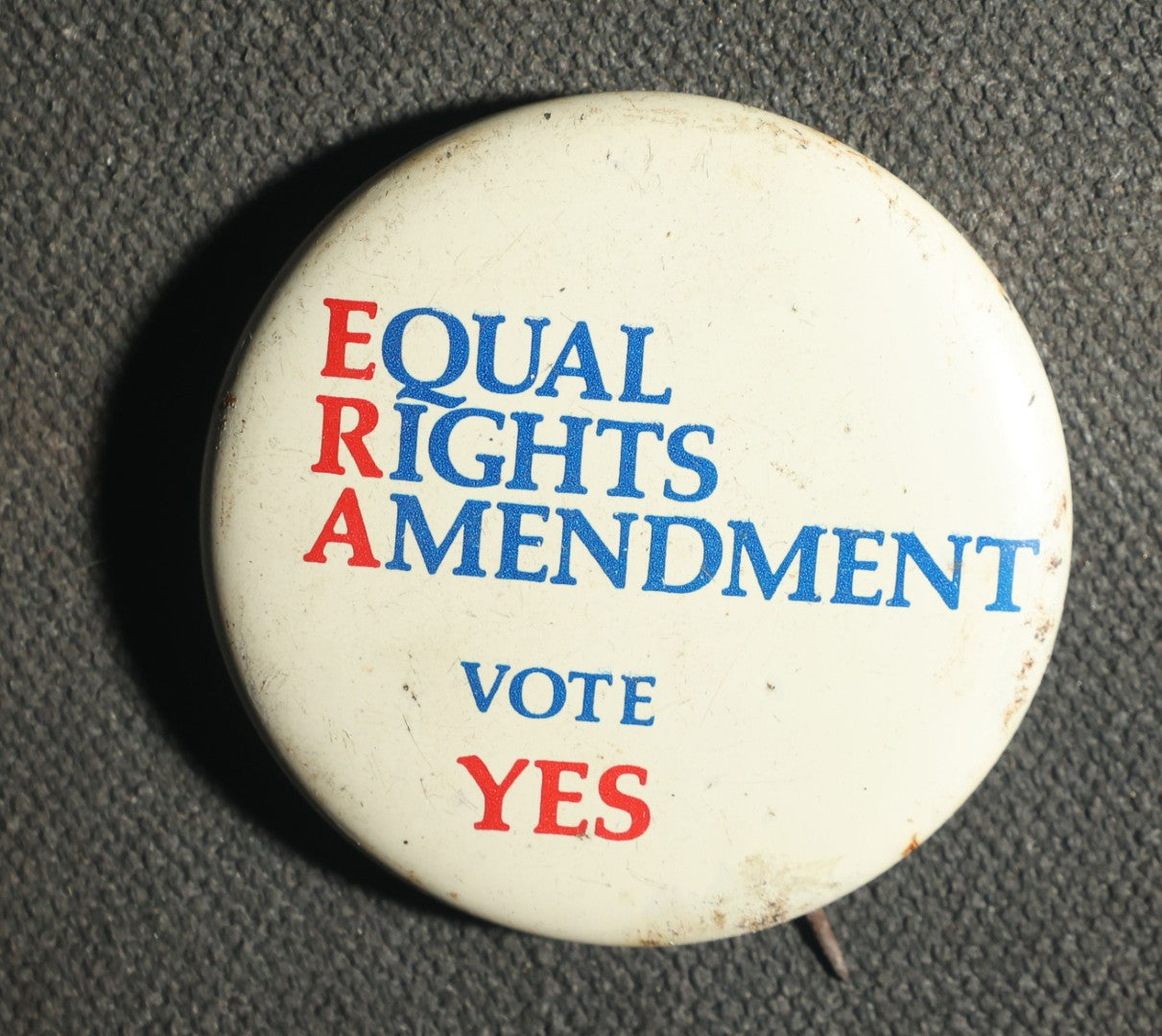 Trio of Political Buttons Including Votes for Women, Equal Rights Ammendment, and Peace Corps