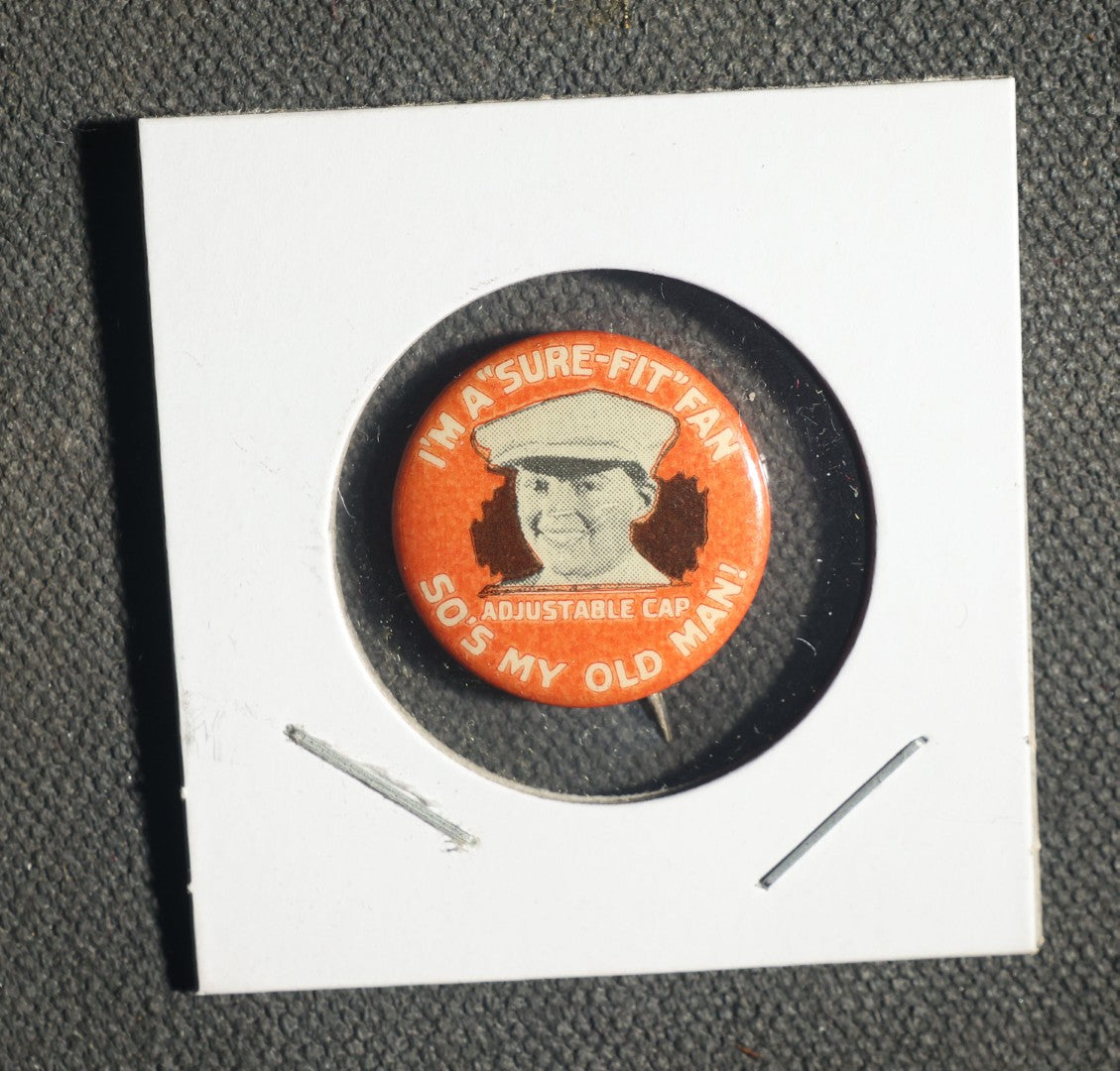Trio of Buttons, Sure-Fit Adjustable Cap, Little Pinkies Soap, and I'm Your Huckleberry