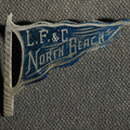 Lot 036 - L.F. & C North Beach Blue Engraved Flag Pin, Missing Pin