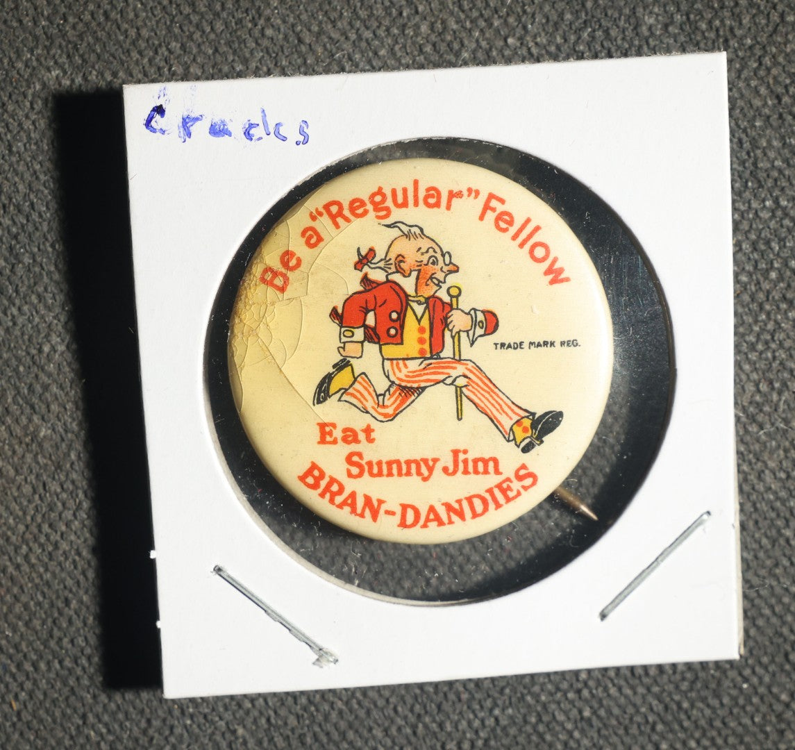 Pair of Cartoon Buttons Including Sunny Jim Bran-Dandies Advertisement and Oswald Ostrich
