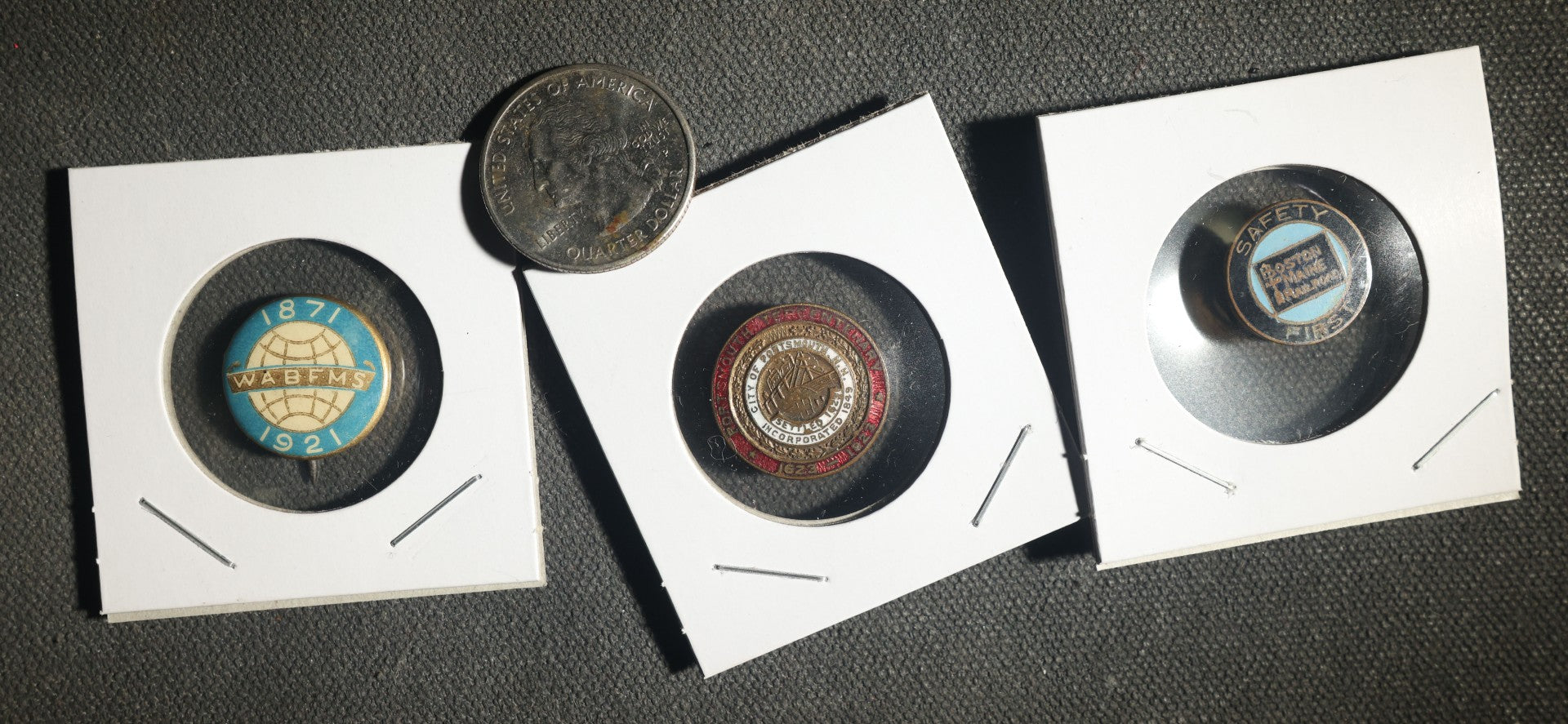 Three Items Including Woman's American Baptist Foreign Mission Society 50 Year Anniversary Button, Portsmouth New Hampshire Tercentenary 1623-1923 Studback, and Boston and Maine Railroad Safety First Stud Back