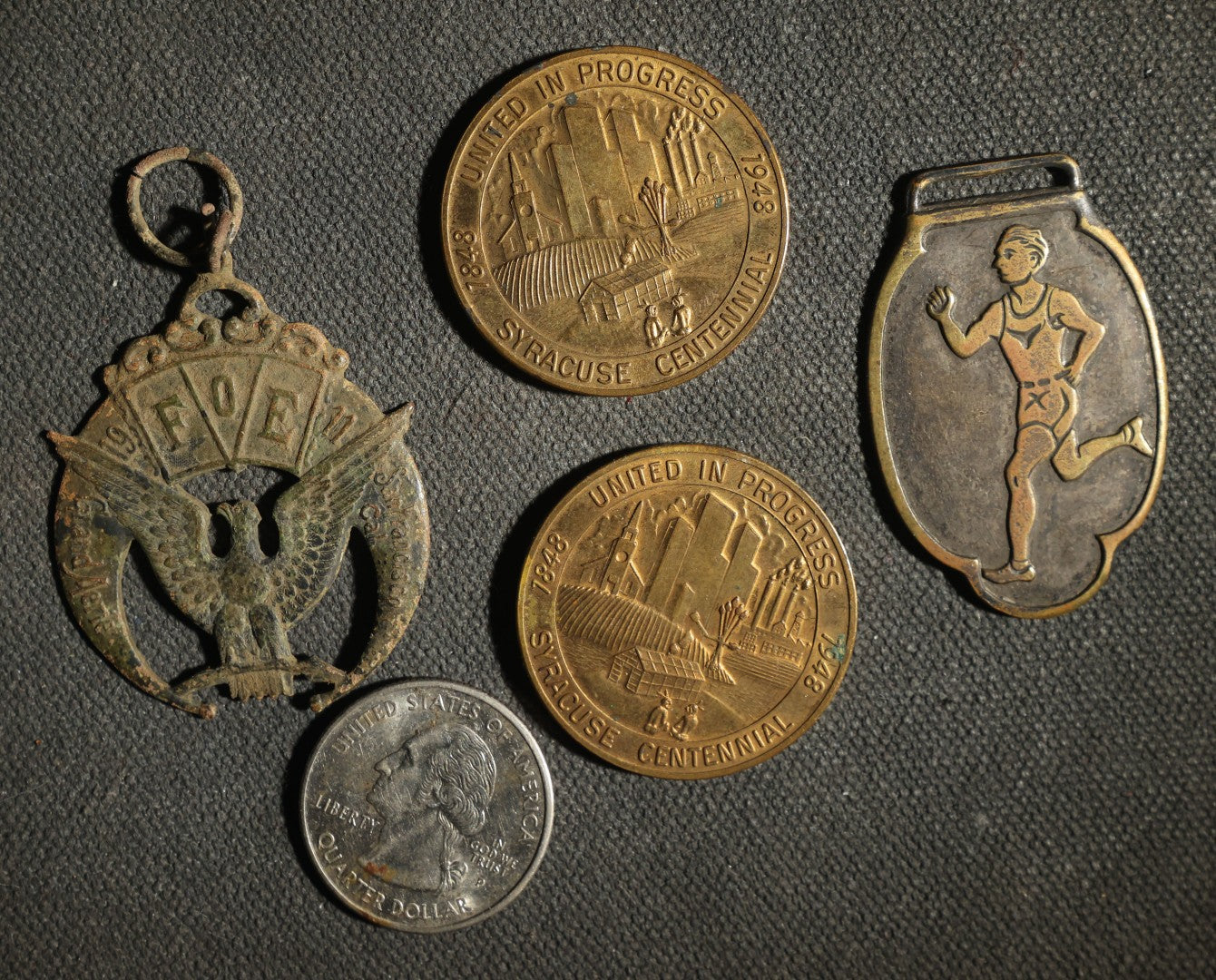 Four Pieces Including Federal Order of Eagles and Track Fobs, and Pair of Syracuse New York Centennial Coins