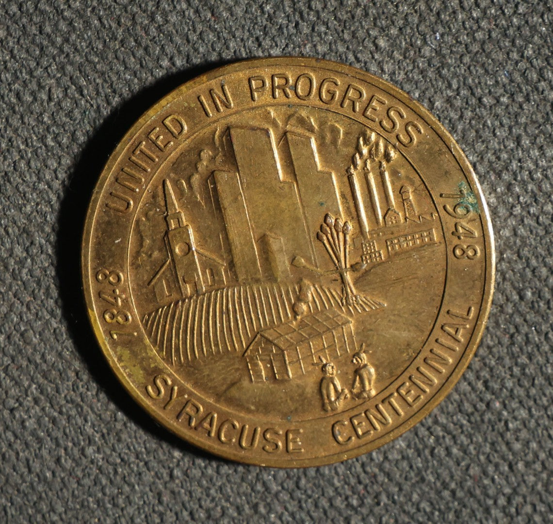 Four Pieces Including Federal Order of Eagles and Track Fobs, and Pair of Syracuse New York Centennial Coins