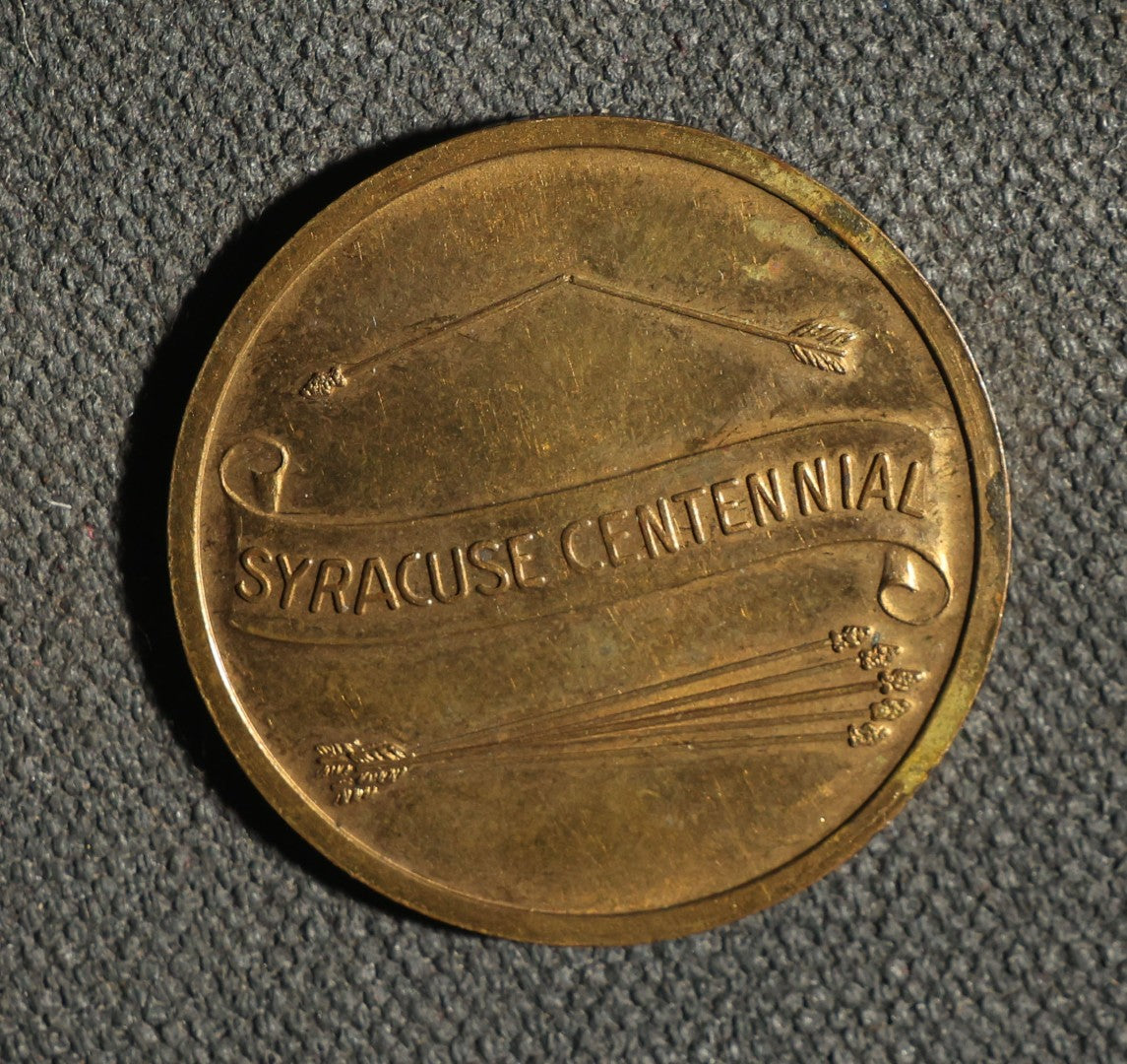 Four Pieces Including Federal Order of Eagles and Track Fobs, and Pair of Syracuse New York Centennial Coins