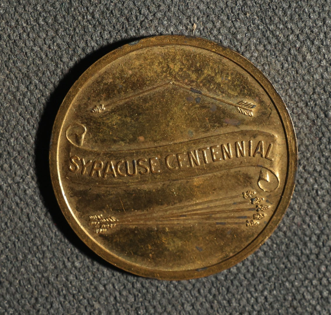Four Pieces Including Federal Order of Eagles and Track Fobs, and Pair of Syracuse New York Centennial Coins