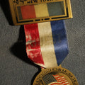 Lot 074 - New York VFW 1943 Plastic Badge and Ribbon, Guest, Frayed