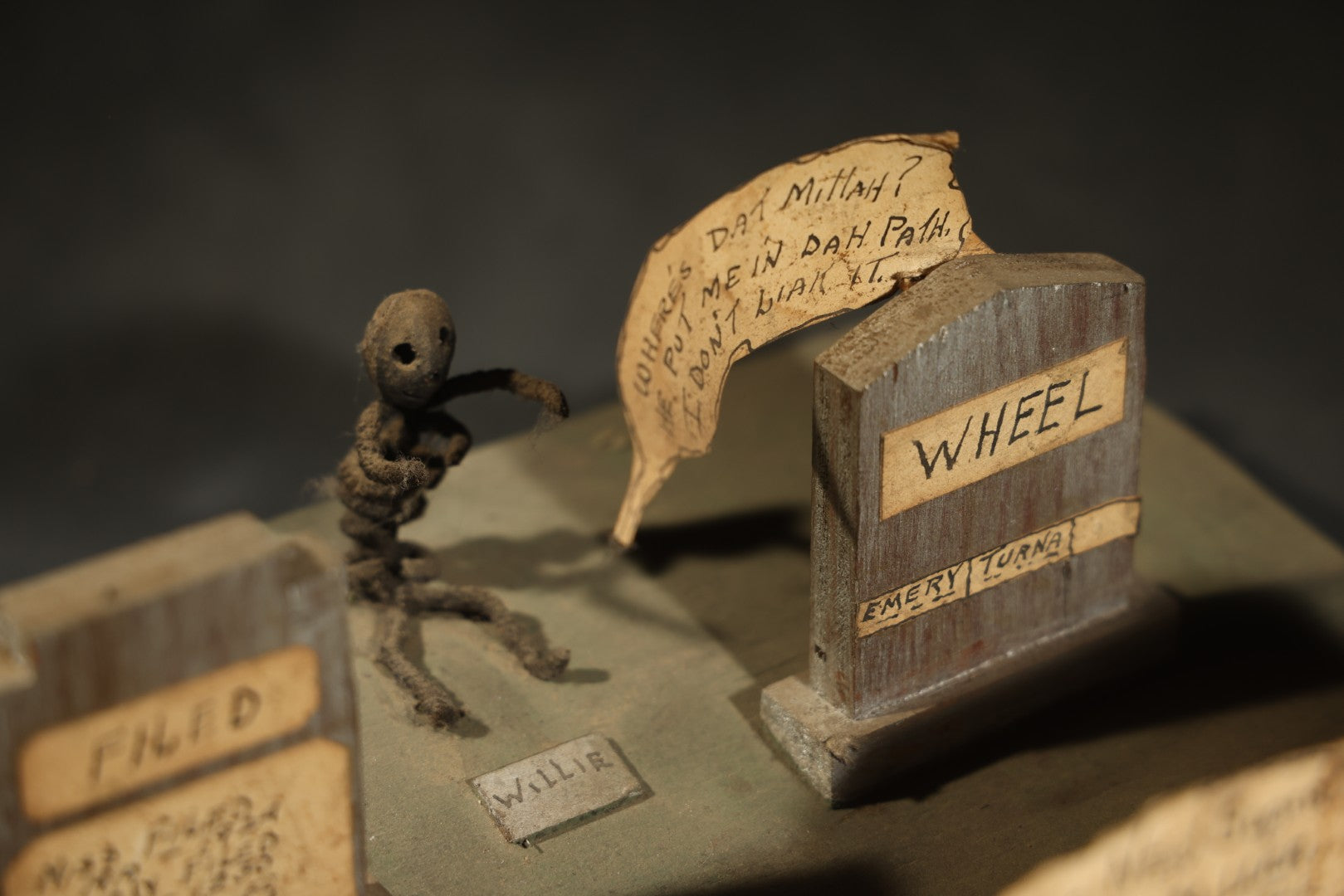 Antique Folk Art Handmade Graveyard Diorama with Wooden Gravestones, Twisted Pipe Cleaner Skeleton Figures, and Hand-Lettered Speech Bubbles, "The Grove Ghosts Inc Knights of Fun"