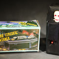 Lot 003 - Vintage "Clockwork Coffin Bank" Wind-Up Skeleton Mechanical Bank, "They Buried Me in Las Vegas" Souvenir, Made in Hong Kong, with Original Box, 6-3/8" L