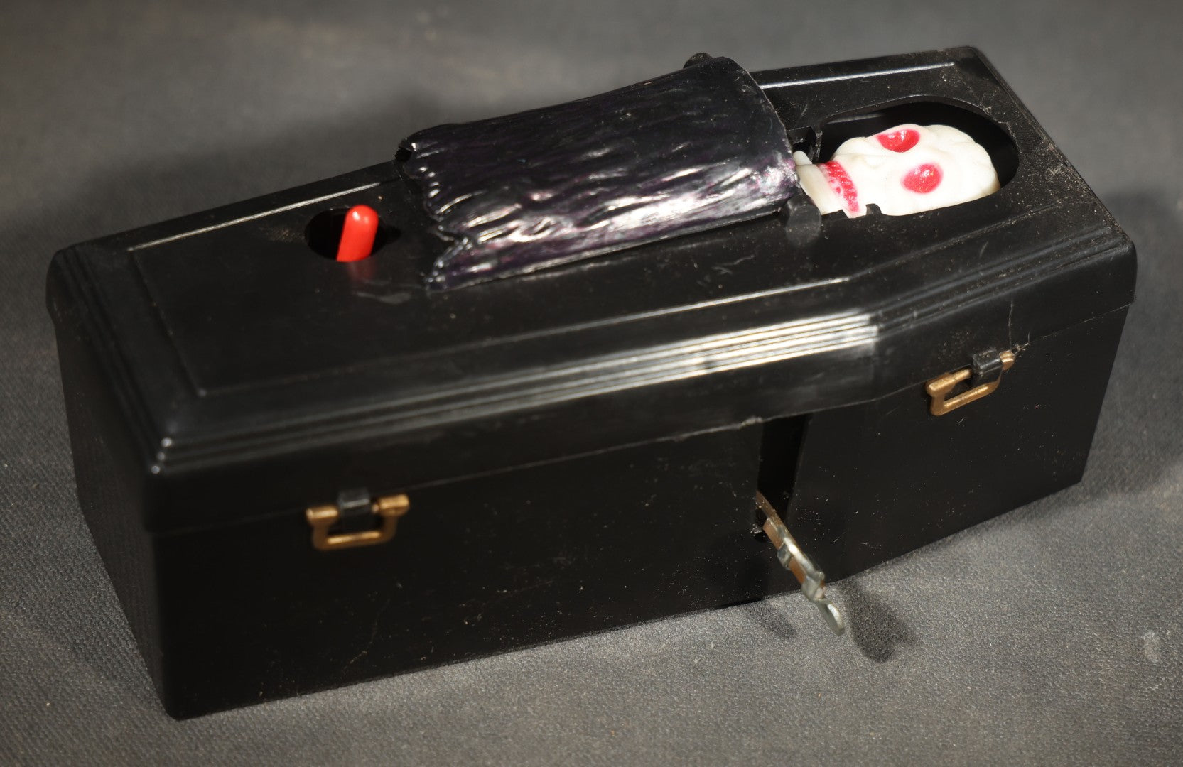 Vintage "Clockwork Coffin Bank" Wind-Up Skeleton Mechanical Bank, "They Buried Me in Las Vegas" Souvenir, Made in Hong Kong, with Original Box