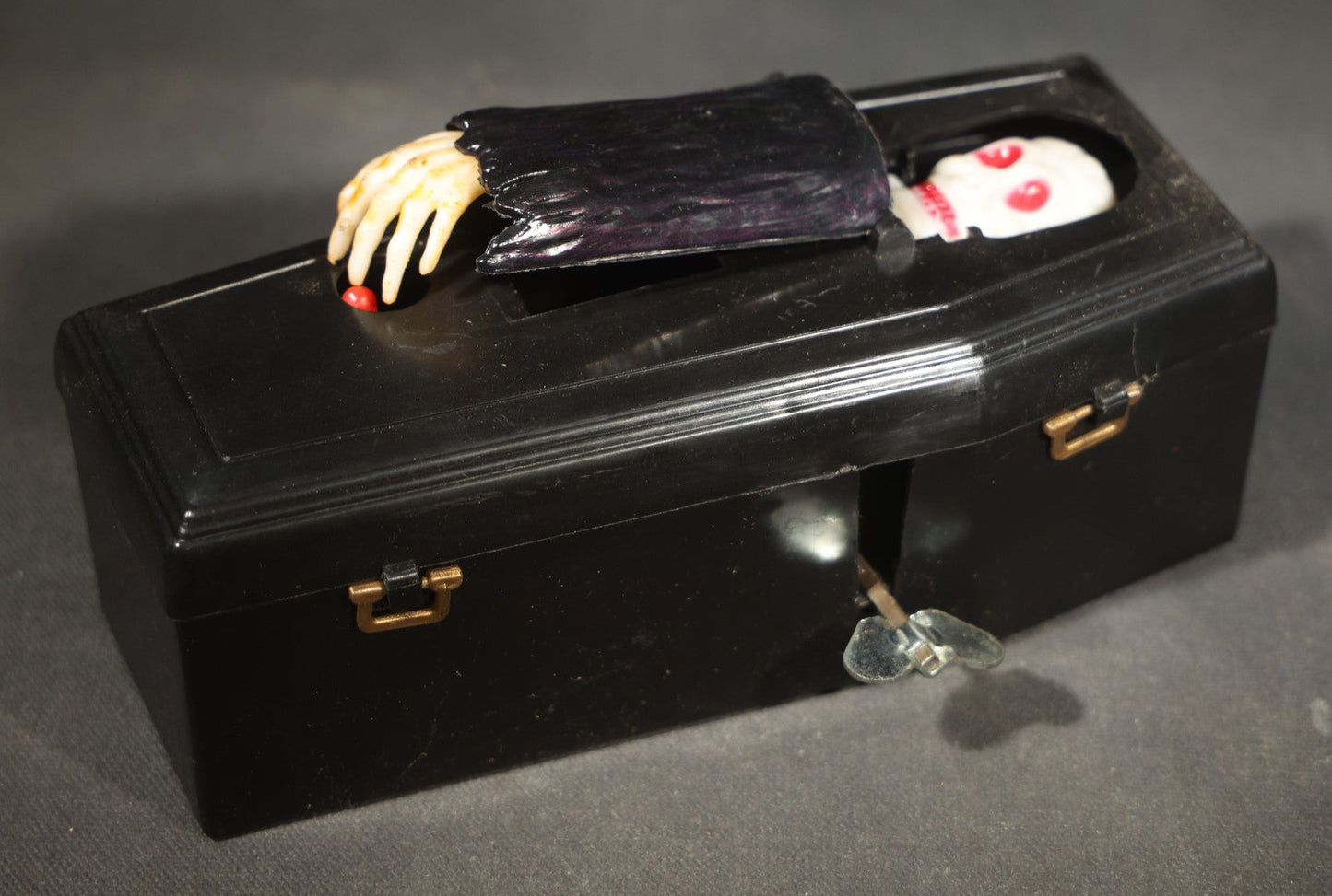 Vintage "Clockwork Coffin Bank" Wind-Up Skeleton Mechanical Bank, "They Buried Me in Las Vegas" Souvenir, Made in Hong Kong, with Original Box