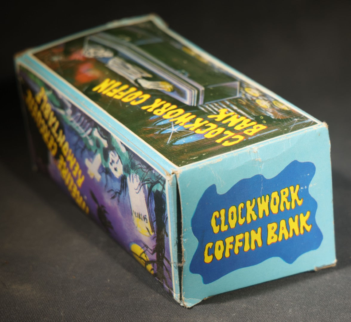 Vintage "Clockwork Coffin Bank" Wind-Up Skeleton Mechanical Bank, "They Buried Me in Las Vegas" Souvenir, Made in Hong Kong, with Original Box