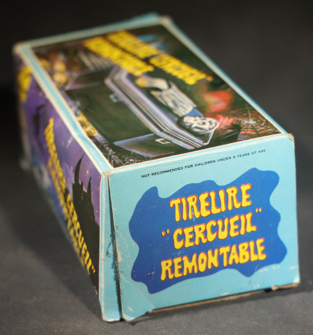 Vintage "Clockwork Coffin Bank" Wind-Up Skeleton Mechanical Bank, "They Buried Me in Las Vegas" Souvenir, Made in Hong Kong, with Original Box