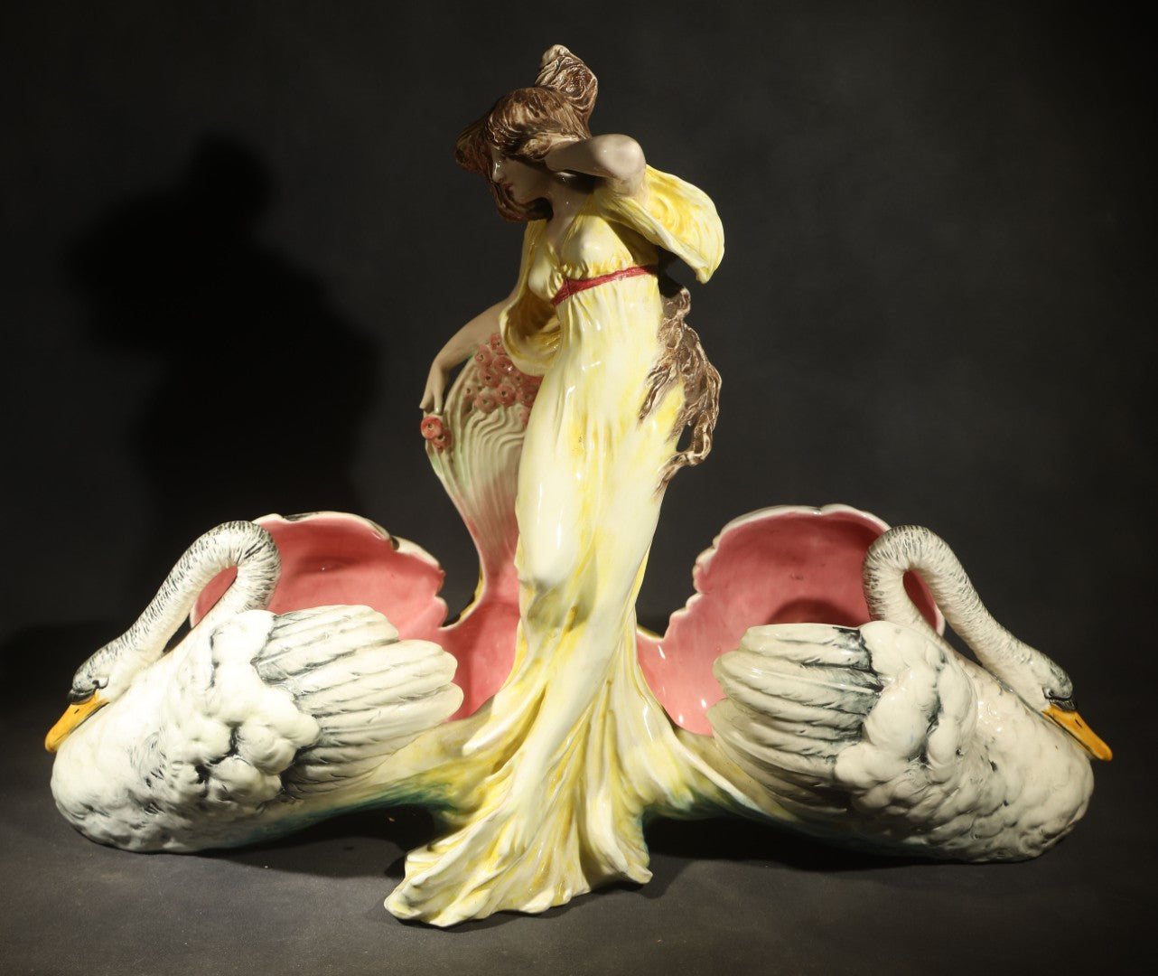 Antique Art Nouveau Eichwald Majolica Figural Planter with Woman in Yellow Dress Flanked by Two Swans, Model 7460, Note Damaged Finger