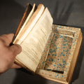 Lot 036 - Antique French-Language Religious Book Safe Made from "L'Imitation De Jésus-Christ Méditée"  Tome Second, with Marbled Paper-Lined Hidden Compartment and "P-V France" Stamp
