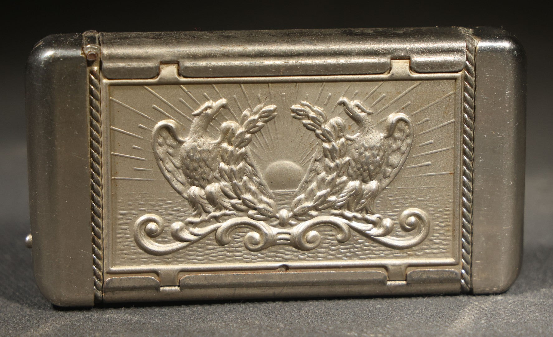 Antique Patriotic Match Safe with Double Eagle and Rising Sun Motif and Union Shield with Crossed Flags and Weapons