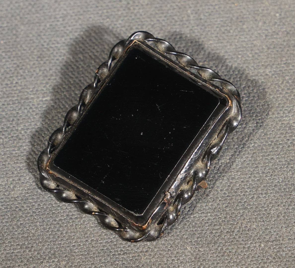 Antique Black Glass Mourning Brooch with Twisted Rope Border in L. Schmidt Diamond Merchant & Optician Jeweler's Box, Braddock, Pennsylvania