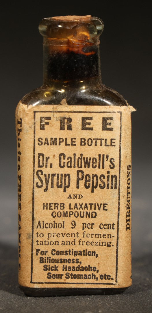 Pair of Antique Pharmaceutical Sample Bottles including Dr. Caldwell's Syrup Pepsin and Upjohn Quinine Sulph. Sample Pill