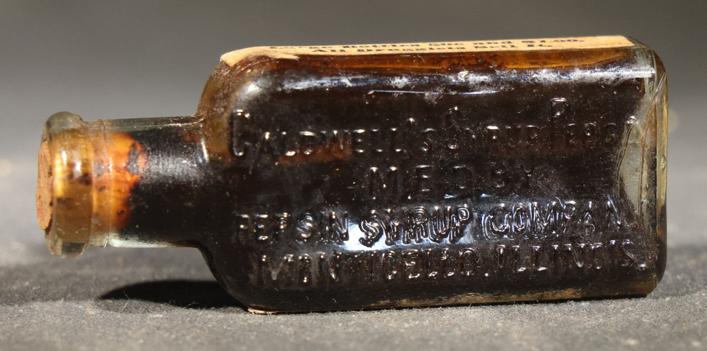 Pair of Antique Pharmaceutical Sample Bottles including Dr. Caldwell's Syrup Pepsin and Upjohn Quinine Sulph. Sample Pill