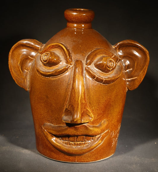 Vintage Brown-Glazed Pottery Face Jug with Applied Features and Teeth, Signed Charlie Galusha, 1999, Note Damaged Ear