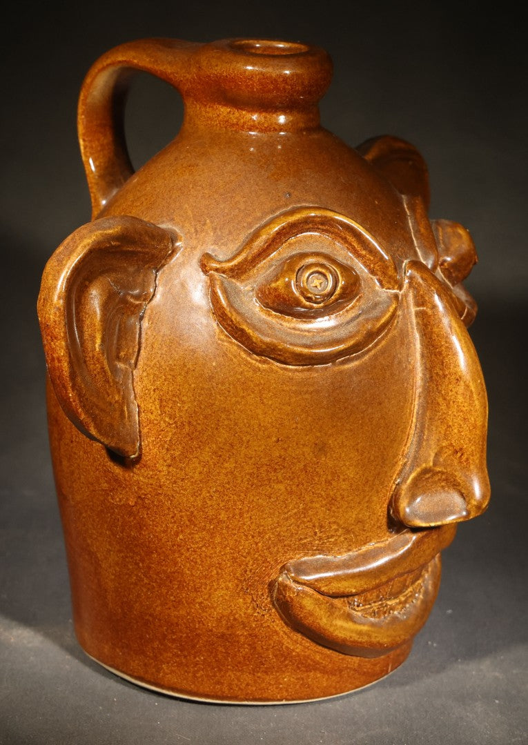 Vintage Brown-Glazed Pottery Face Jug with Applied Features and Teeth, Signed Charlie Galusha, 1999, Note Damaged Ear
