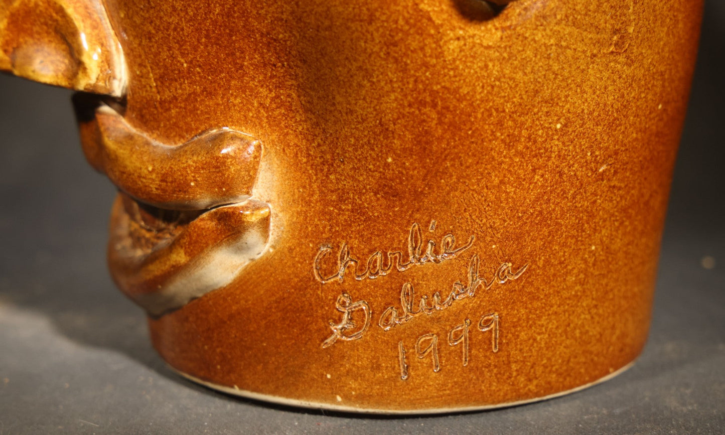Vintage Brown-Glazed Pottery Face Jug with Applied Features and Teeth, Signed Charlie Galusha, 1999, Note Damaged Ear