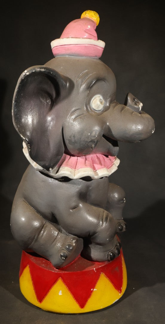 Vintage Chalkware Circus Elephant Coin Bank Carnival Prize, Seated on Red and Yellow Drum with Pink Ruffle Collar and Hat