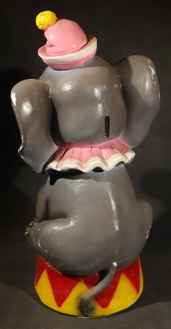 Vintage Chalkware Circus Elephant Coin Bank Carnival Prize, Seated on Red and Yellow Drum with Pink Ruffle Collar and Hat