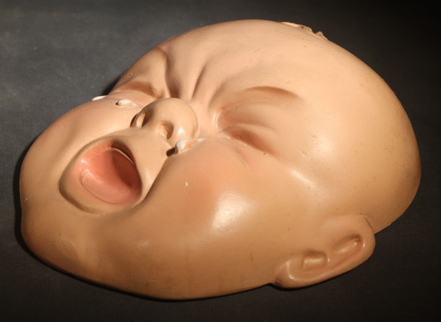 Pair of Vintage Chalkware Baby Face Wall Plaques with Happy and Crying Expressions