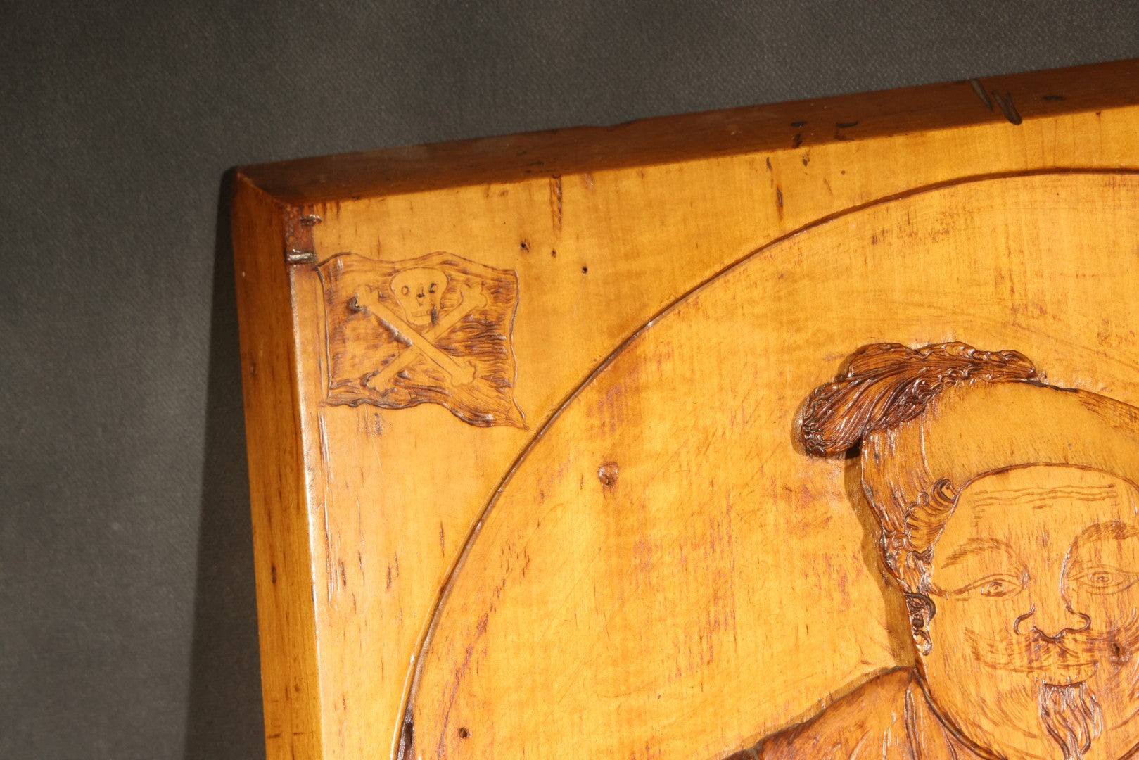 Antique Folk Art Carved and Burned Wood Relief Panel "The Bold Buccaneer" with Pirate, Jolly Roger, and Noose, Inscribed to the Crew of the Ship "Stand Pat," New Haven, Connecticut, August 1907