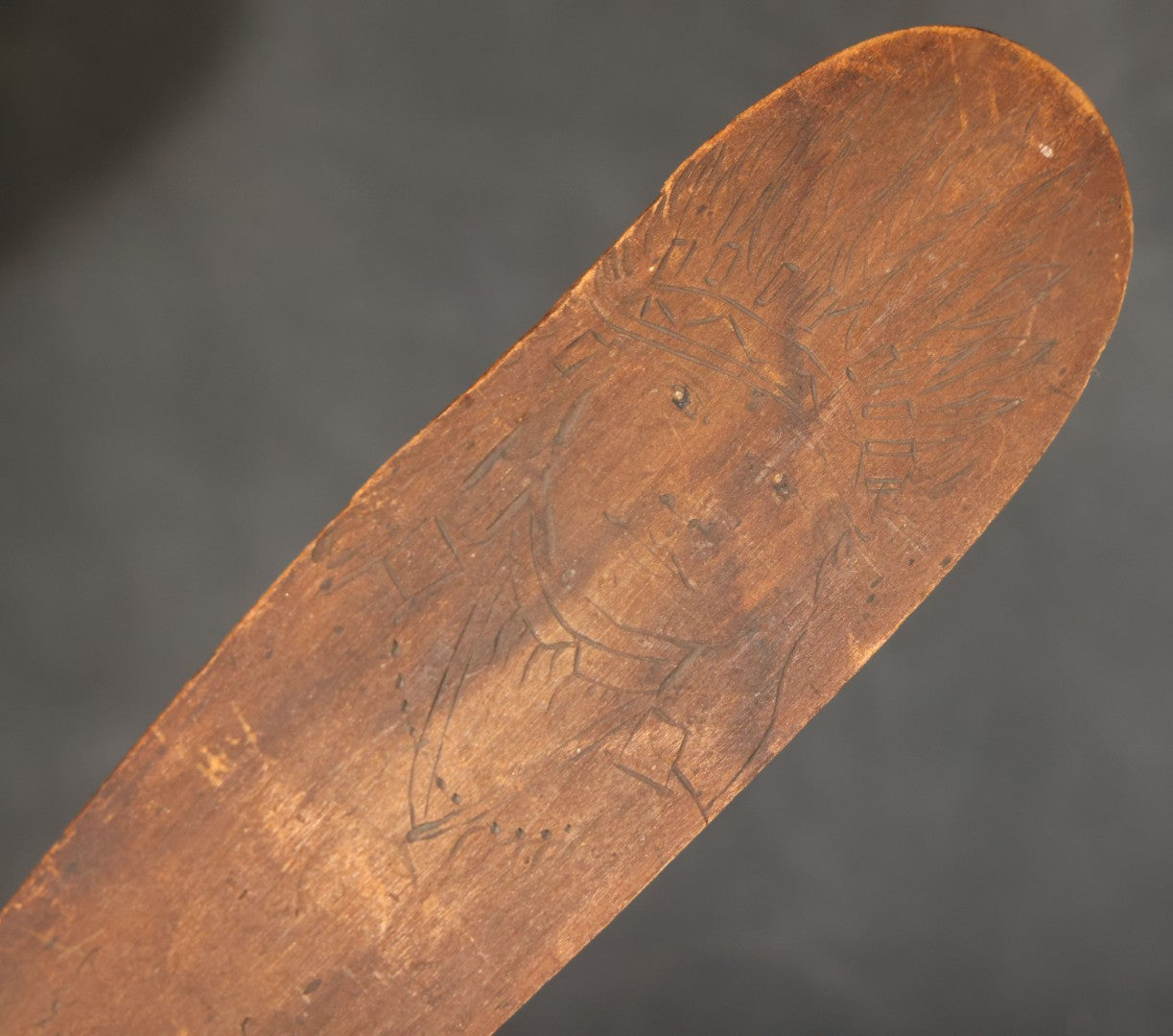 Antique Folk Art Wooden Paddle with Pyrography Portrait of Native American in Feathered Headdress