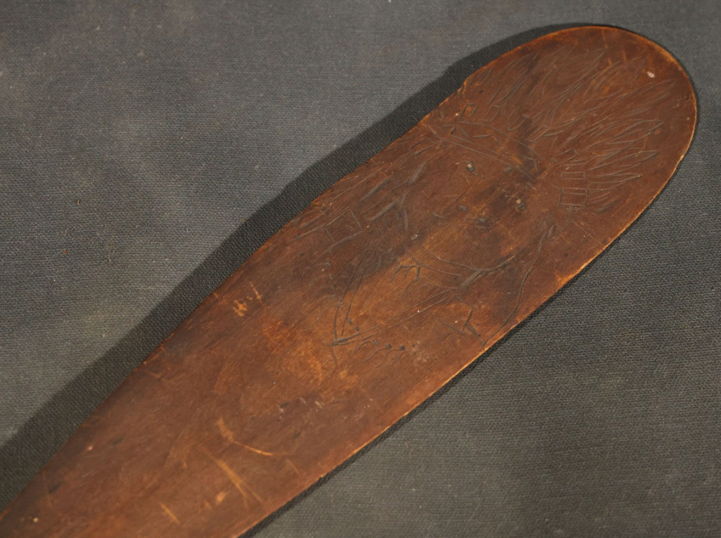 Antique Folk Art Wooden Paddle with Pyrography Portrait of Native American in Feathered Headdress