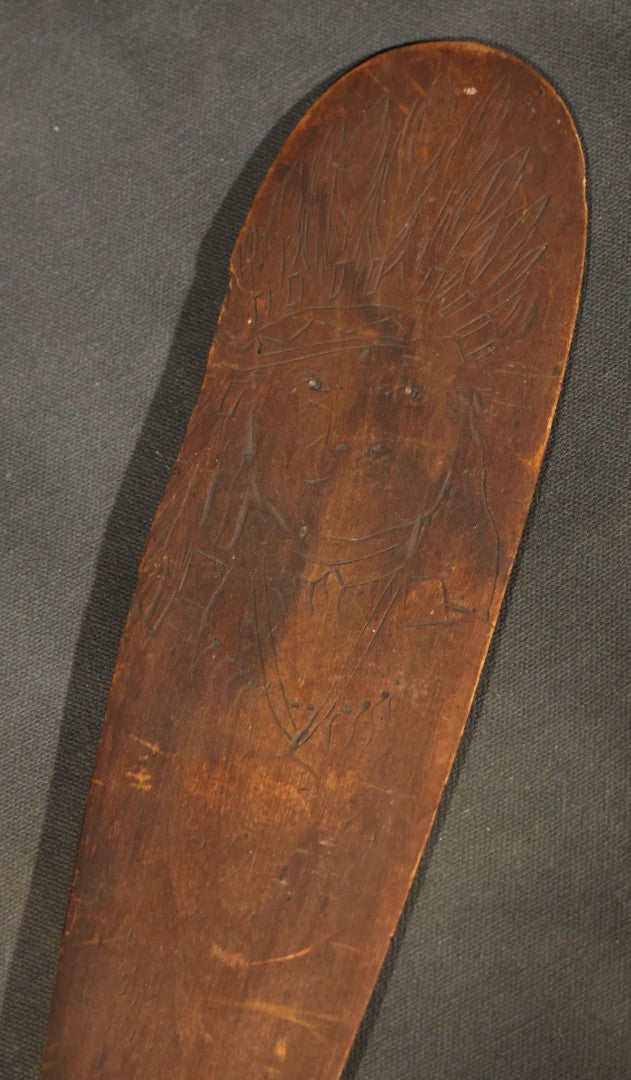 Antique Folk Art Wooden Paddle with Pyrography Portrait of Native American in Feathered Headdress