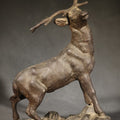 Lot 104 - Antique Cast Metal Stag Figure on Naturalistic Base with Foliage, 10" H