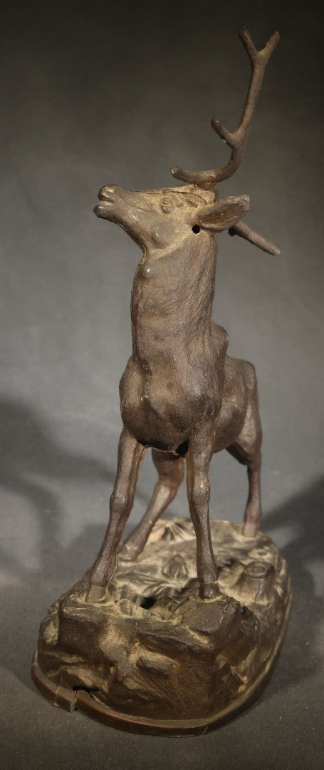 Antique Cast Metal Stag Figure on Naturalistic Base with Foliage
