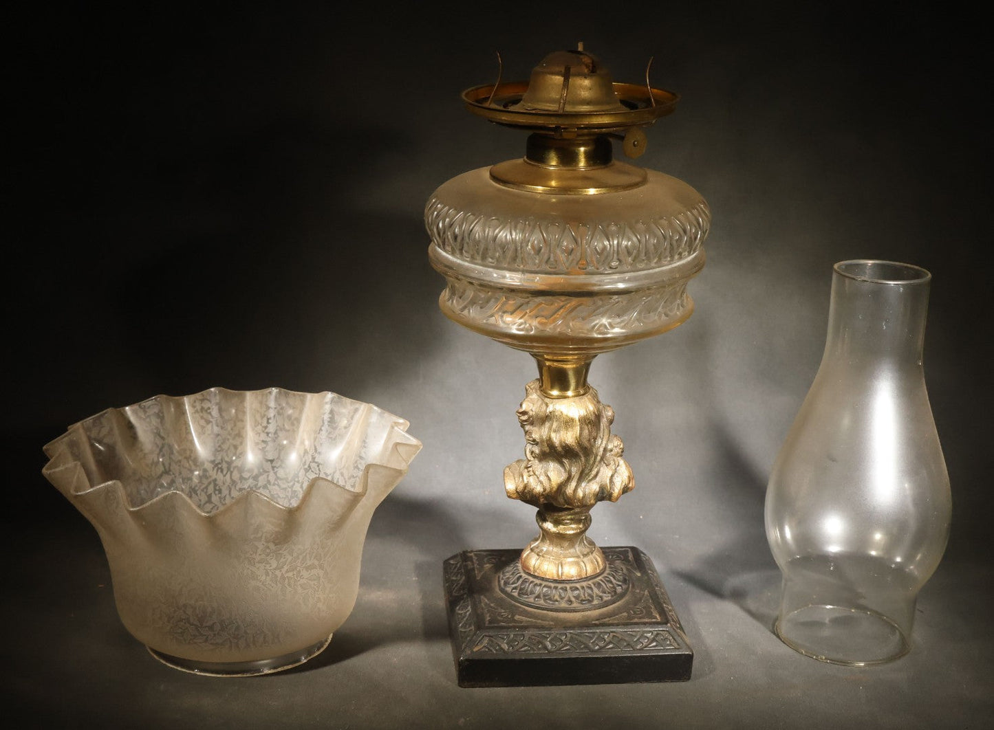 Antique Figural Bust Oil Lamp with Pressed Glass Font, Ruffled Frosted Shade, and Glass Chimney