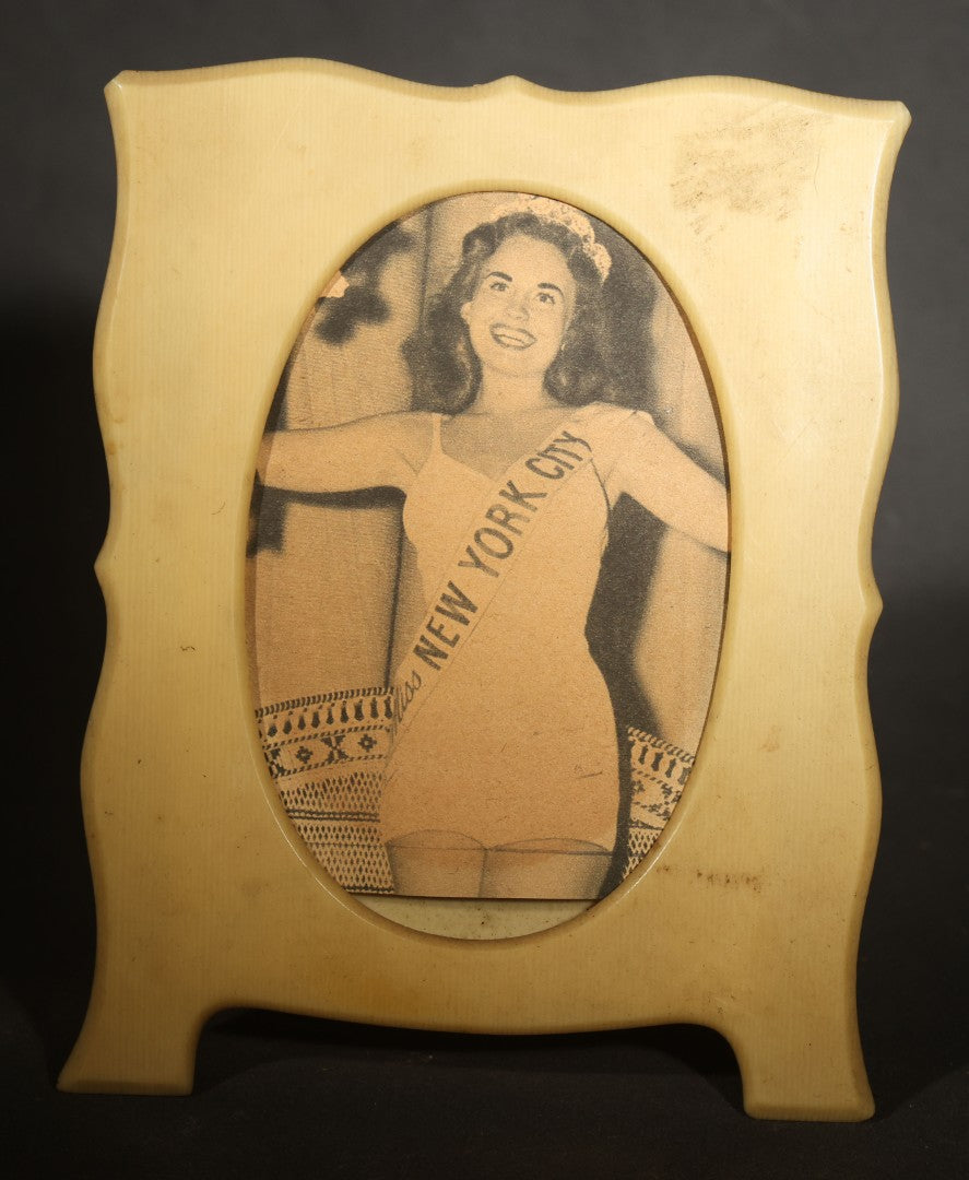 Vintage Celluloid Easel-Back Frame with Oval Opening, Containing "Miss New York City" Beauty Pageant Newspaper Clipping