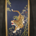 Lot 116 - Vintage Framed Japanese Silk Embroidery of a Roaring Tiger Among Bamboo and Rocks on Navy Ground, Inscribed on Verso March 29, 1976, 15-5/8" W x 30-1/2" H